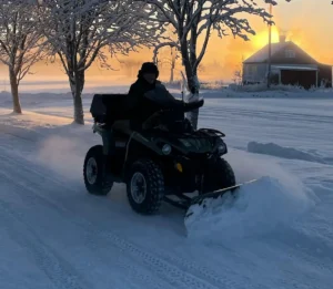 Odnśnieżanie Quadem